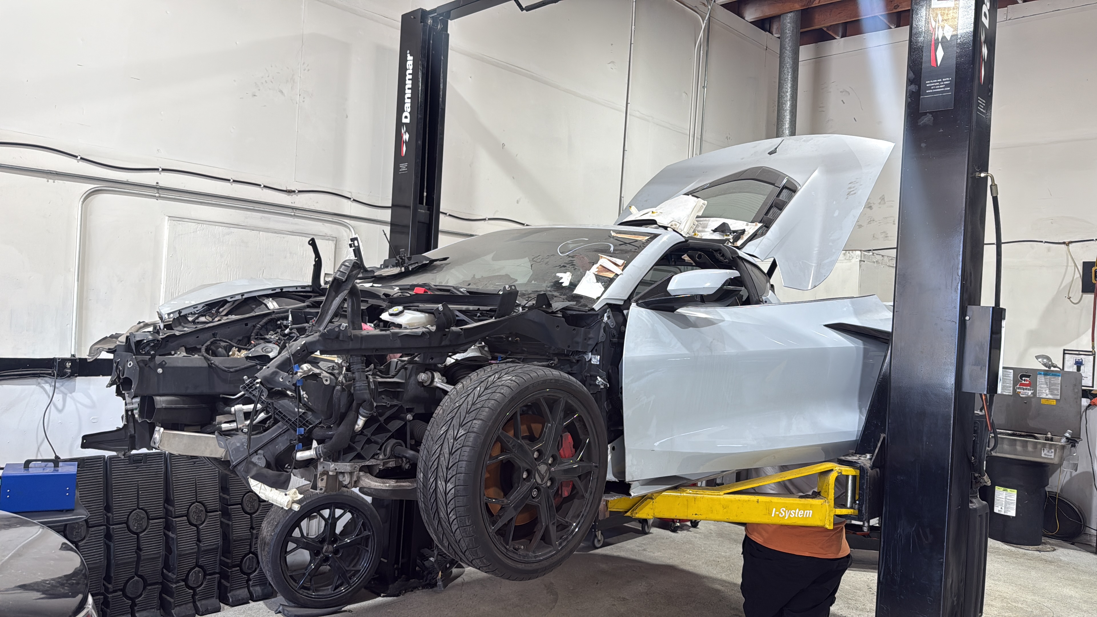 Vehicle on lift at Spada Auto shop