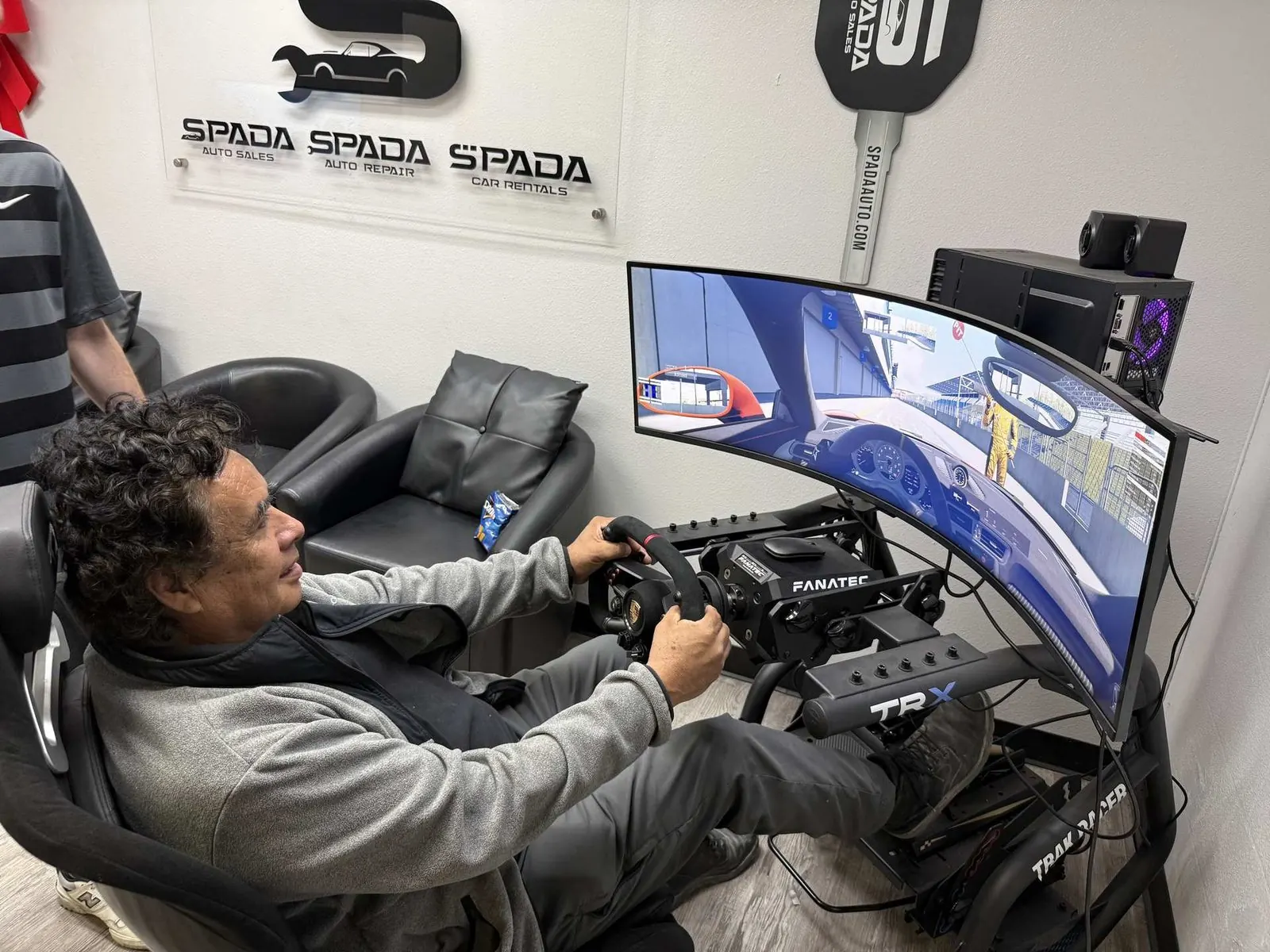 Customer lounge with racing simulator